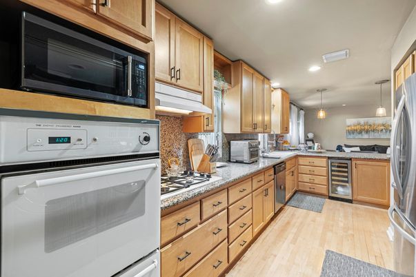 Interior, Kitchen, Pendant Lights, Recessed Lighting, Stainless Steel Appliances, Wood Texture Flooring