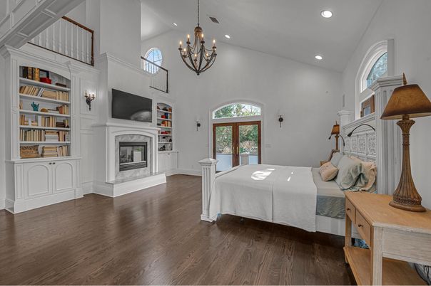 Bedroom, Chandelier, Fireplace, Interior, Recessed Lighting, Wood Texture Flooring