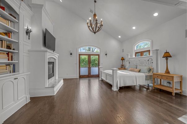 Bedroom, Chandelier, Fireplace, Interior, Recessed Lighting, Wood Texture Flooring