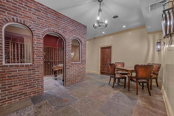 Chandelier, Dining room, Interior, Pendant Lights, Recessed Lighting, Stone Walls, Wine Storage