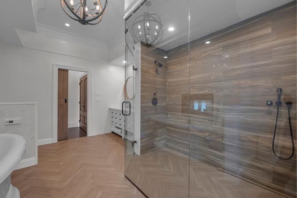 Bathroom, Chandelier, Glass Shower, Interior, Recessed Lighting, Wood Texture Flooring