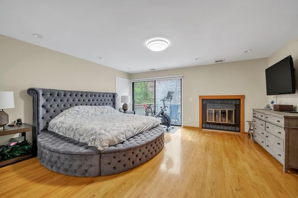 Bedroom, Fireplace, Interior, Recessed Lighting, Wood Texture Flooring