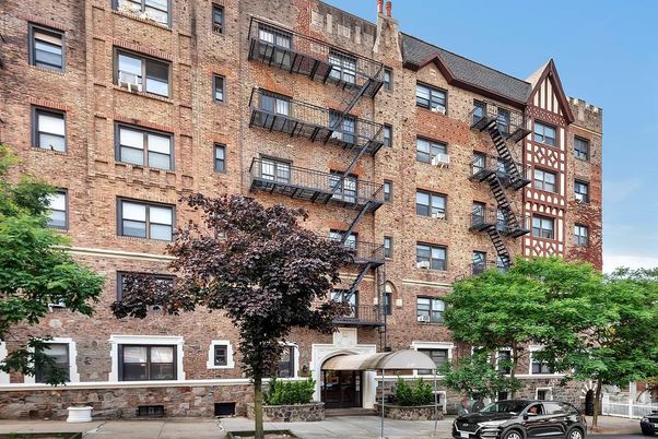 Exterior, Facade, Brick Facade, Condo Building