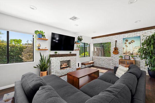 Fireplace, Interior, Living room, Recessed Lighting, Stone Walls, Wood Texture Flooring