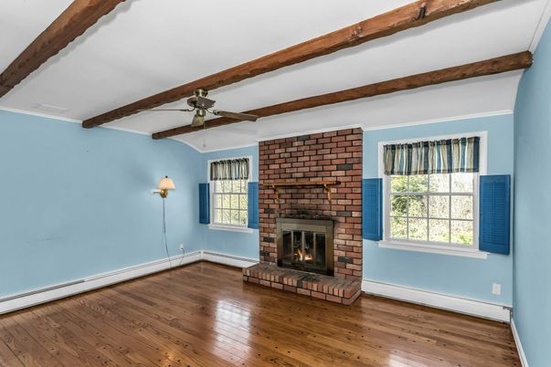 Empty room, Fireplace, Interior, Stone Walls, Wooden Beams, Wood Texture Flooring
