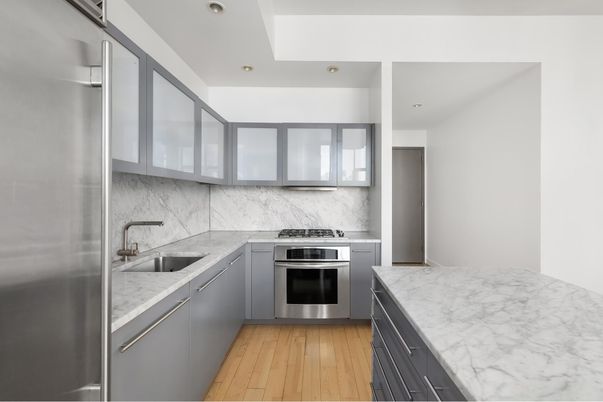 Interior, Kitchen, Marble Walls, Recessed Lighting, Stainless Steel Appliances, Wood Texture Flooring