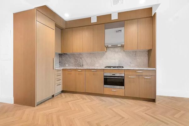 Interior, Kitchen, Marble Walls, Recessed Lighting, Stainless Steel Appliances, Wood Texture Flooring