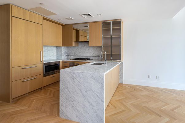 Interior, Kitchen, Marble Walls, Recessed Lighting, Stainless Steel Appliances, Wood Texture Flooring