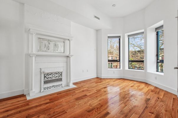 Empty room, Fireplace, Interior, Recessed Lighting, Wood Texture Flooring