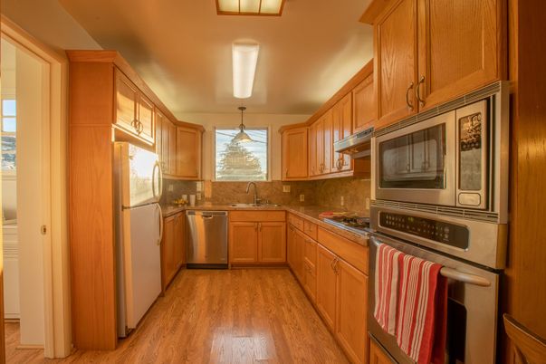 Interior, Kitchen, Pendant Lights, Stainless Steel Appliances, Wood Texture Flooring
