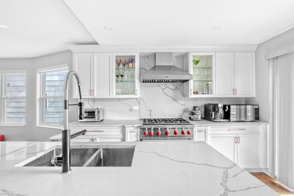 Interior, Kitchen, Marble Walls, Recessed Lighting, Stainless Steel Appliances