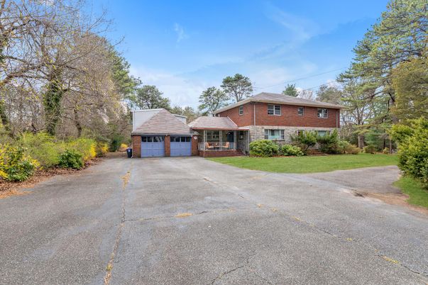 Attached, Backyard, Exterior, Facade, Brick Facade, Split Level