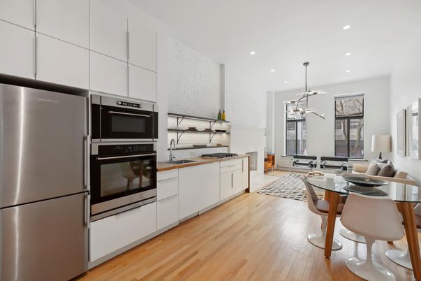 Dining room, Interior, Kitchen, Pendant Lights, Recessed Lighting, Stainless Steel Appliances, Wood Texture Flooring