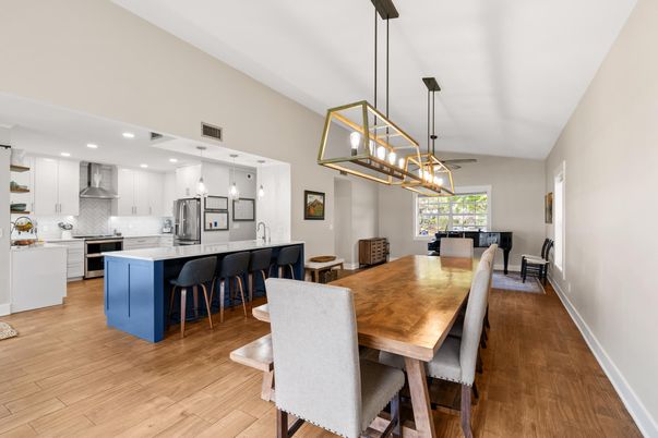 Dining room, Interior, Kitchen, Pendant Lights, Recessed Lighting, Stainless Steel Appliances, Wood Texture Flooring