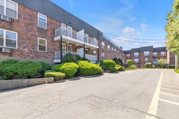 Exterior, Facade, Brick Facade, Condo Building