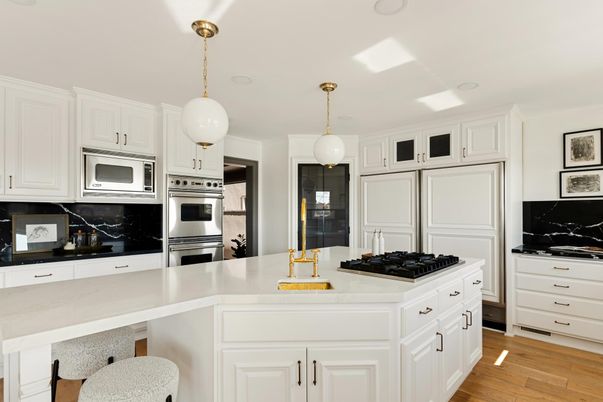 Interior, Kitchen, Marble Walls, Pendant Lights, Recessed Lighting, Stainless Steel Appliances, Wood Texture Flooring