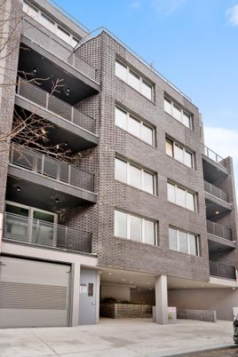 Attached, Exterior, Facade, Brick Facade, Condo Building