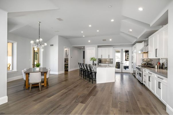 Dining room, Interior, Kitchen, Pendant Lights, Recessed Lighting, Stainless Steel Appliances, Wood Texture Flooring