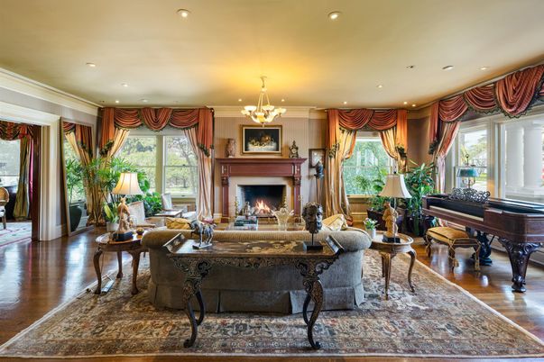 Chandelier, Fireplace, Interior, Living room, Piano, Recessed Lighting, Wood Texture Flooring