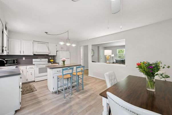 Dining room, Interior, Kitchen, Pendant Lights, Stainless Steel Appliances, Wood Texture Flooring
