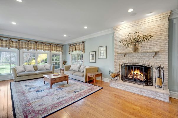 Fireplace, Interior, Living room, Recessed Lighting, Stone Walls, Wood Texture Flooring