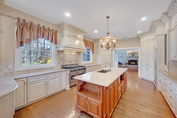 Chandelier, Fireplace, Interior, Kitchen, Recessed Lighting, Wood Texture Flooring