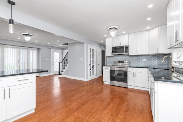 Chandelier, Interior, Kitchen, Pendant Lights, Recessed Lighting, Stainless Steel Appliances, Wood Texture Flooring