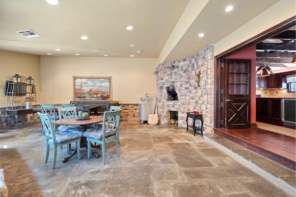Dining room, Fireplace, Interior, Recessed Lighting, Stone Walls
