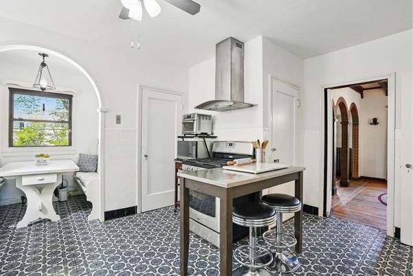 Dining room, Interior, Kitchen, Pendant Lights, Stainless Steel Appliances, Wood Texture Flooring