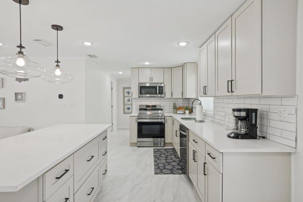 Interior, Kitchen, Marble, Pendant Lights, Recessed Lighting, Stainless Steel Appliances