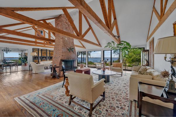 Dining room, Fireplace, Interior, Living room, Stone Walls, Water, Wooden Beams, Wood Texture Flooring