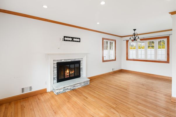 Empty room, Fireplace, Interior, Pendant Lights, Recessed Lighting, Wood Texture Flooring