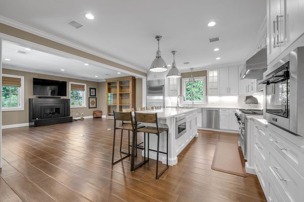 Fireplace, Interior, Kitchen, Pendant Lights, Recessed Lighting, Stainless Steel Appliances, Wood Texture Flooring