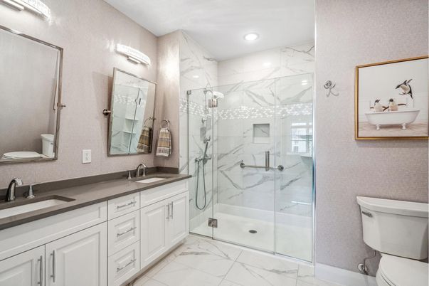 Bathroom, Dual Sink Vanities, Glass Shower, Interior, Marble, Marble Walls, Recessed Lighting