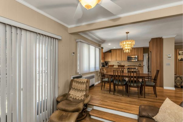 Chandelier, Dining room, Interior, Kitchen, Stainless Steel Appliances, Wood Texture Flooring