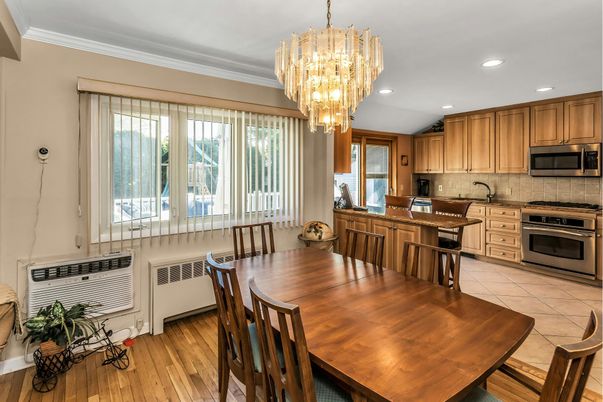 Chandelier, Dining room, Interior, Kitchen, Recessed Lighting, Stainless Steel Appliances, Wood Texture Flooring