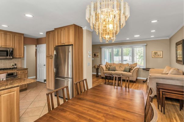 Chandelier, Dining room, Interior, Kitchen, Living room, Recessed Lighting, Stainless Steel Appliances, Wood Texture Flooring