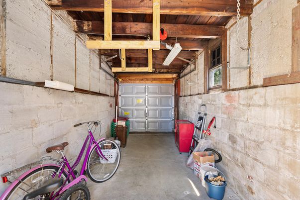 Garage, Interior, Stone Walls, Wooden Beams