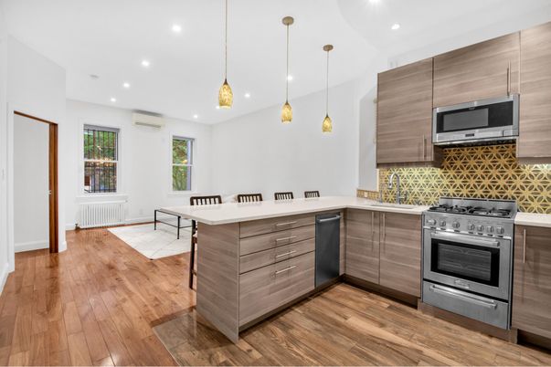 Dining room, Interior, Kitchen, Pendant Lights, Recessed Lighting, Stainless Steel Appliances, Wood Texture Flooring