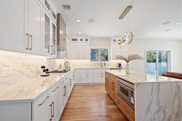 Interior, Kitchen, Marble Walls, Pendant Lights, Recessed Lighting, Stainless Steel Appliances, Wood Texture Flooring