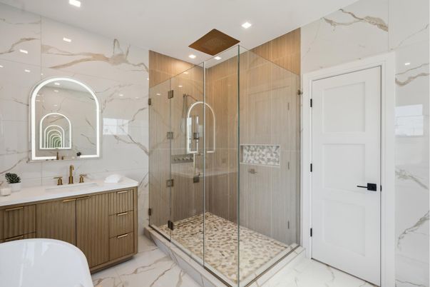 Bathroom, Dual Sink Vanities, Glass Shower, Interior, Marble, Marble Walls, Recessed Lighting