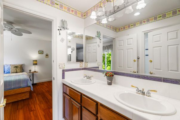 Bathroom, Dual Sink Vanities, Interior, Tile Countertops, Wood Texture Flooring