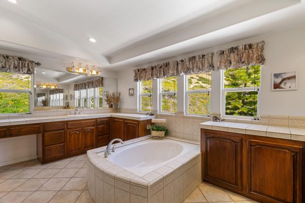 Bathroom, Dual Sink Vanities, Interior, Recessed Lighting, Tile Countertops