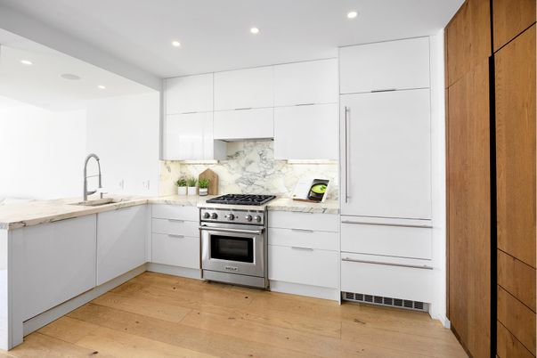 Interior, Kitchen, Marble Walls, Recessed Lighting, Stainless Steel Appliances, Wood Texture Flooring