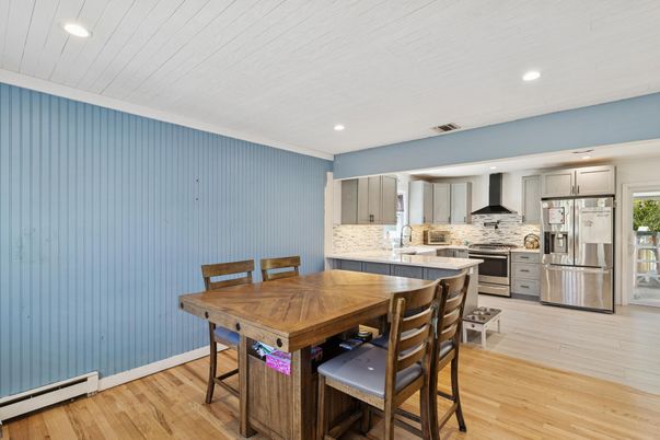 Dining room, Interior, Kitchen, Recessed Lighting, Stainless Steel Appliances, Wood Texture Flooring