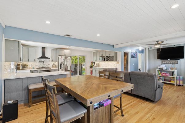 Dining room, Interior, Kitchen, Recessed Lighting, Stainless Steel Appliances, Wood Texture Flooring