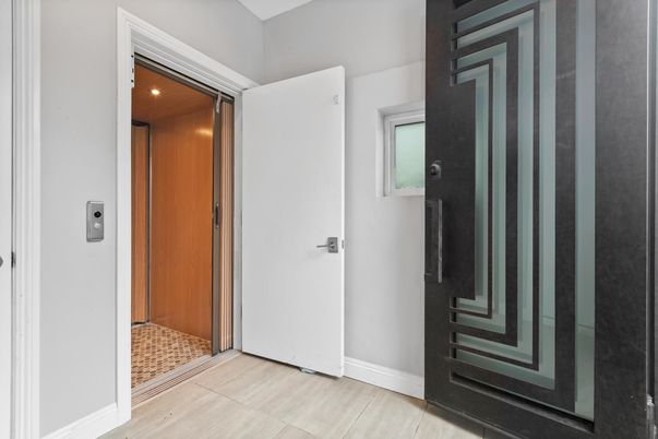 Elevator, Interior, Recessed Lighting, Wood Texture Flooring, Wooden Walls
