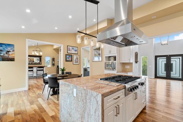 Dining room, Interior, Kitchen, Pendant Lights, Recessed Lighting, Stainless Steel Appliances, Wood Texture Flooring