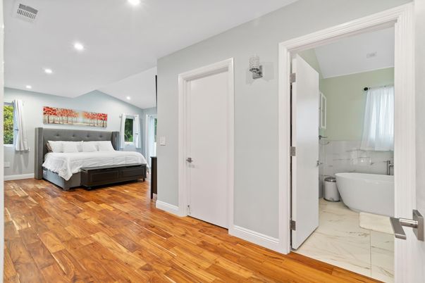 Bathroom, Bedroom, Free Standing Baths, Interior, Marble, Recessed Lighting, Wood Texture Flooring
