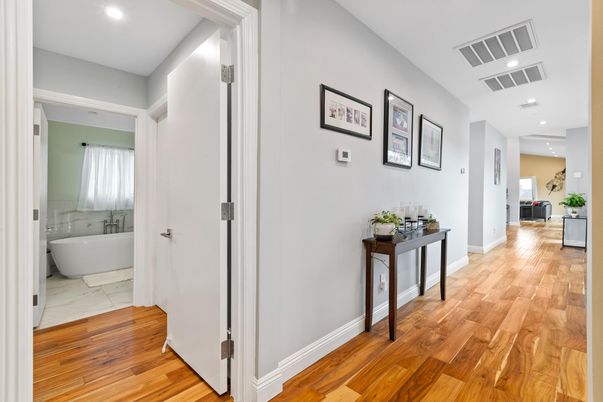 Bathroom, Free Standing Baths, Interior, Marble, Recessed Lighting, Wood Texture Flooring